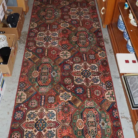 edged piece of carpet - green, red, blues L2920 W1000