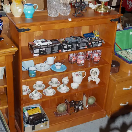 solid rimu bookcase with metal binding H1210 W1000 D310