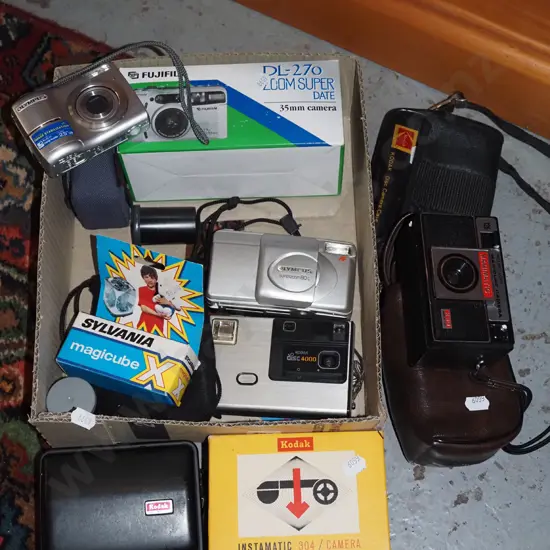 box; Kodak disc camera, Fujifilm, 35mm camera etc