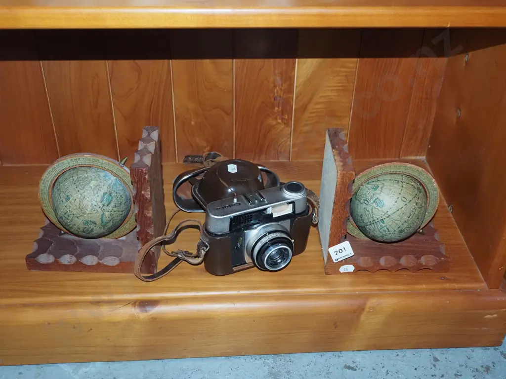 2x globe themed bookends, leather cased Colora 35mm camera Image 1++