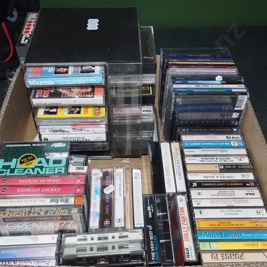 box of CDs, tape cassettes