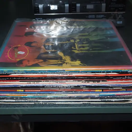 stack of LPs; B52s, Manhattan Transfer etc