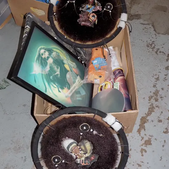 box; dream catcher, various prints, fluffy dice etc