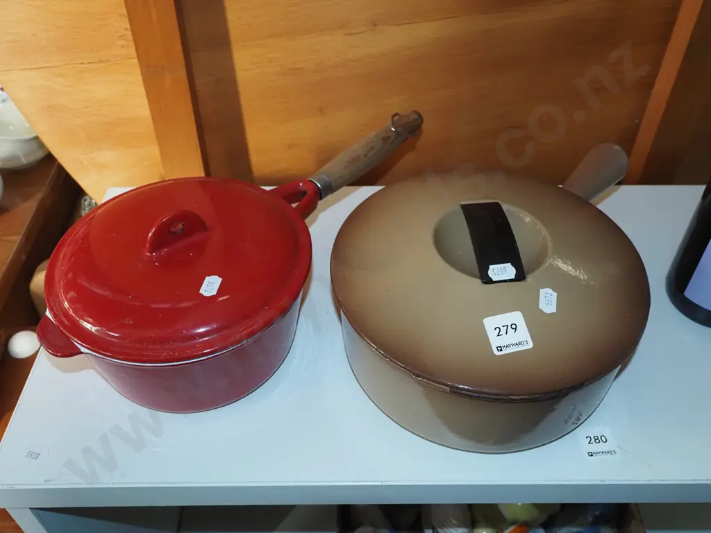 2x cast iron and enamel lidded pots - some damage to brown pot Image 1++