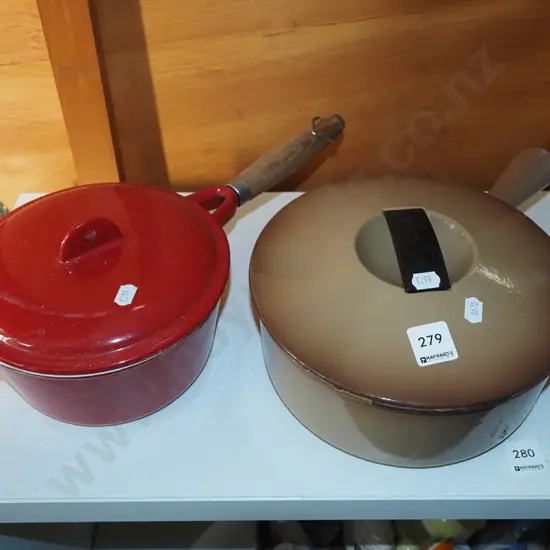 2x cast iron and enamel lidded pots - some damage to brown pot