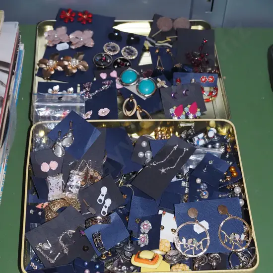 tin; costume jewellery earrings