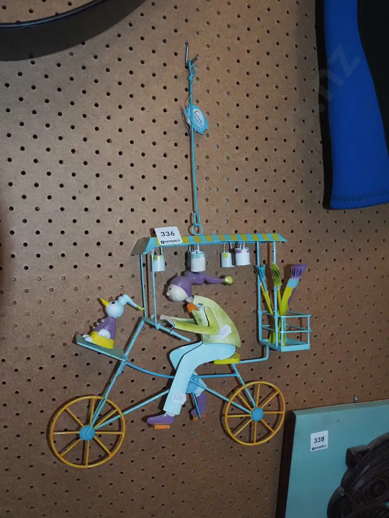 metal hanging figurine - person on bike Image 1++