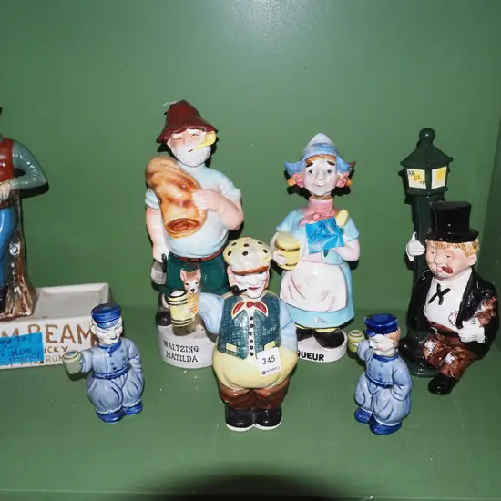 various novelty decanters - some have repairs and cracks