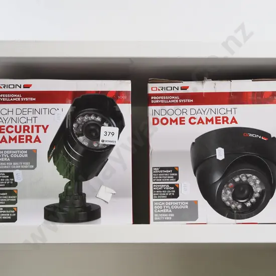 2x boxed security cameras