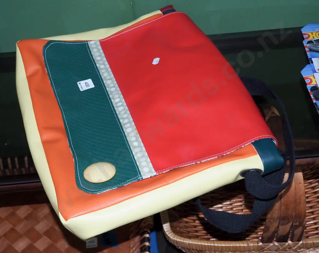 multi coloured vinyl upholstered satchel Image 1++