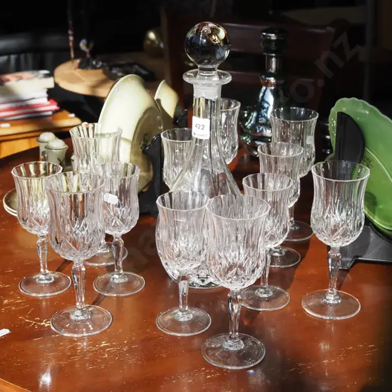decanter, numerous wine glasses