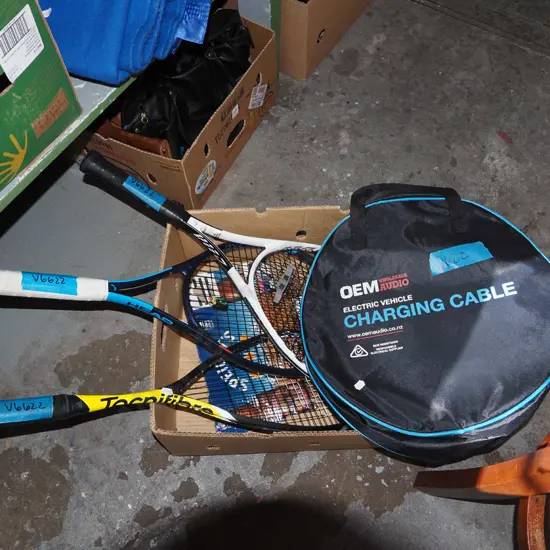 box; tennis rackets, EV charging cable