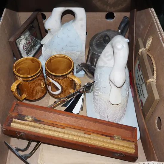 swan themed bookends, beer tankards, boomerang etc