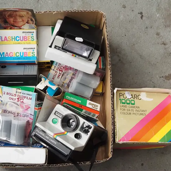 box; photography items, camera flashes, 35mm films etc