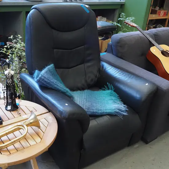 black vinyl reclining armchair