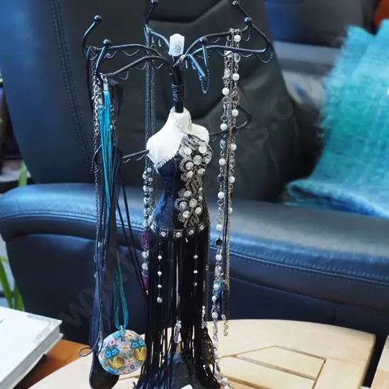 jewellery stand and necklaces