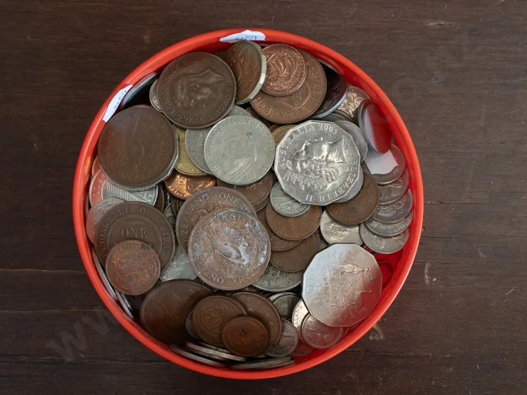 plastic container of coins Image 1++