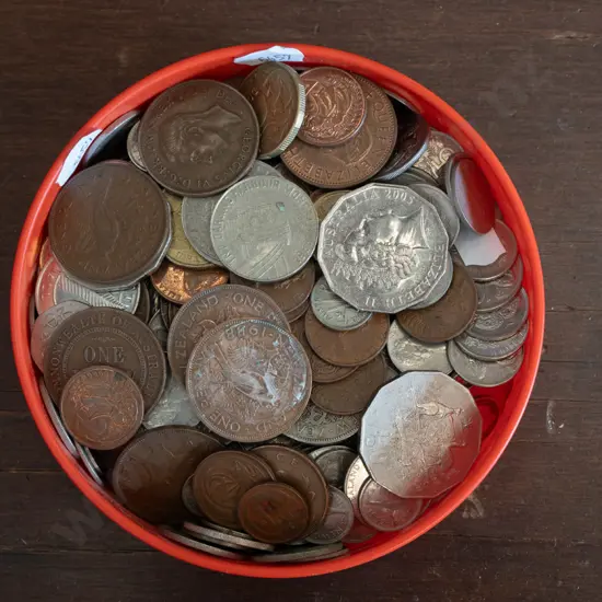 plastic container of coins