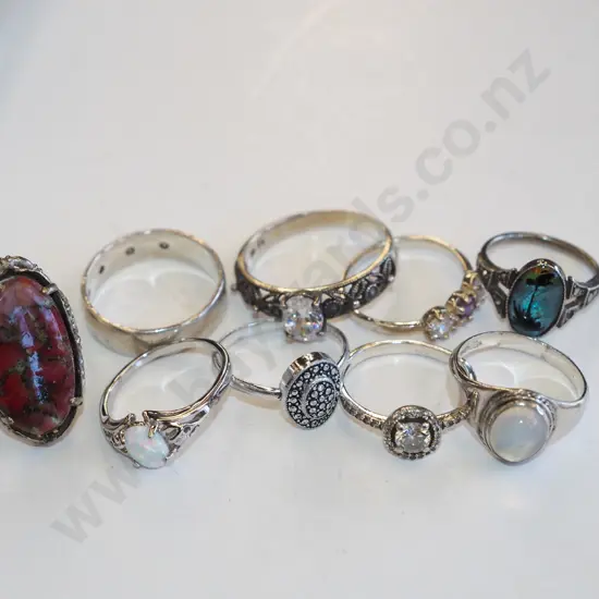 assorted sterling silver and silver plated rings