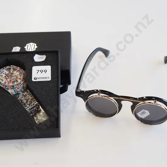 sunglasses, sparkly wristwatch