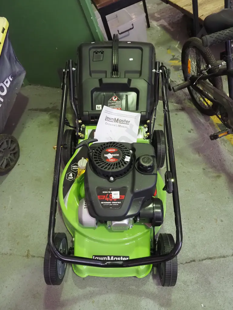 as new Lawnmaster 4 stroke motor mower Image 1++