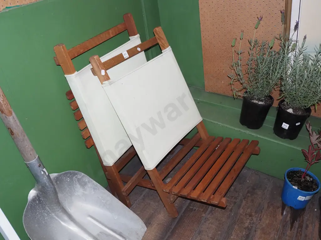 pair of hardwood and canvas beach chairs Image 1++