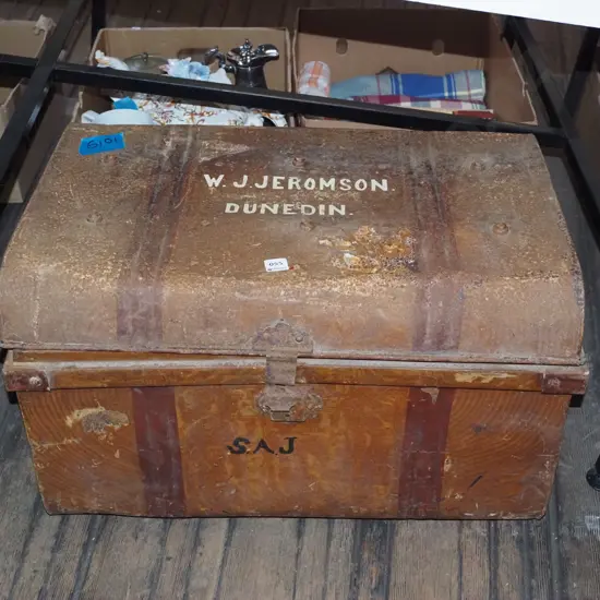 rusty metal traveller's trunk