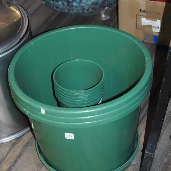 assorted green plastic garden planters Largest H360
