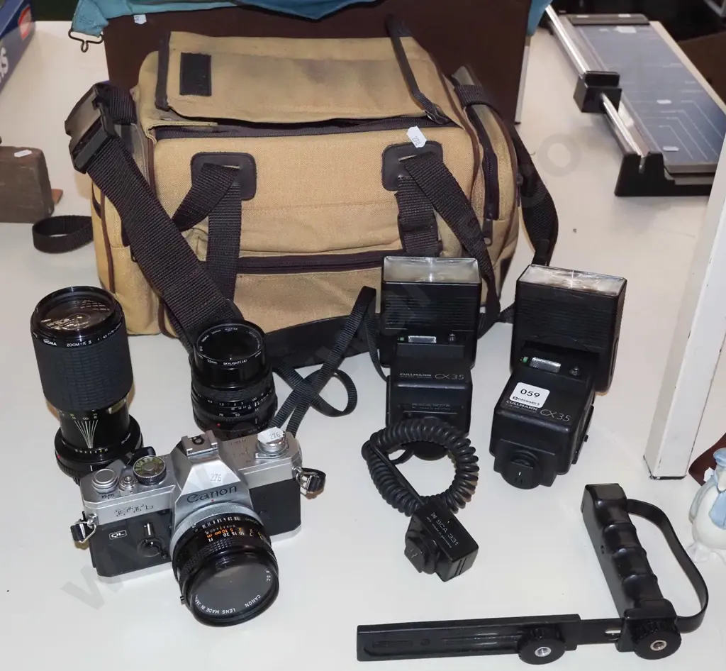 Canon FTB 35mm camera with lenses, flashes, bag Image 1++