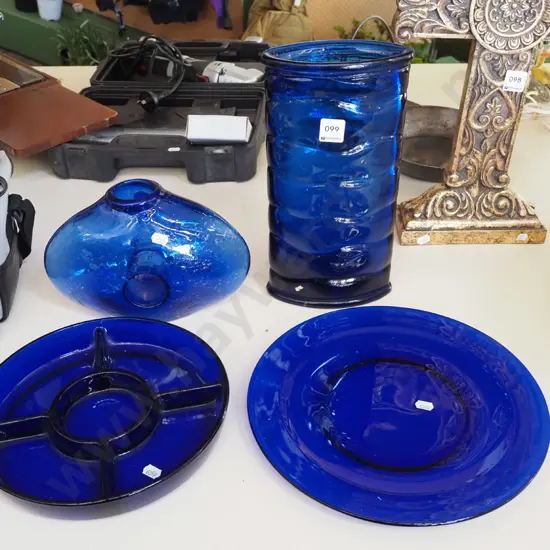 assorted blue glass items; plates, vase H310