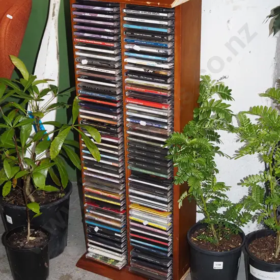 CD tower and CDs - edges have been cut H840