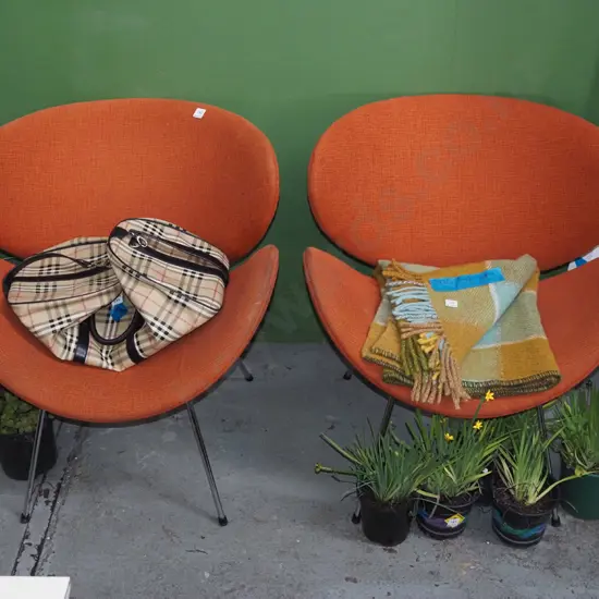 pair of orange upholstered lip chairs - marks to upholstery