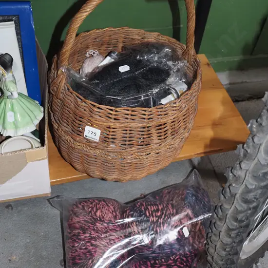 cane basket, knitting yarn