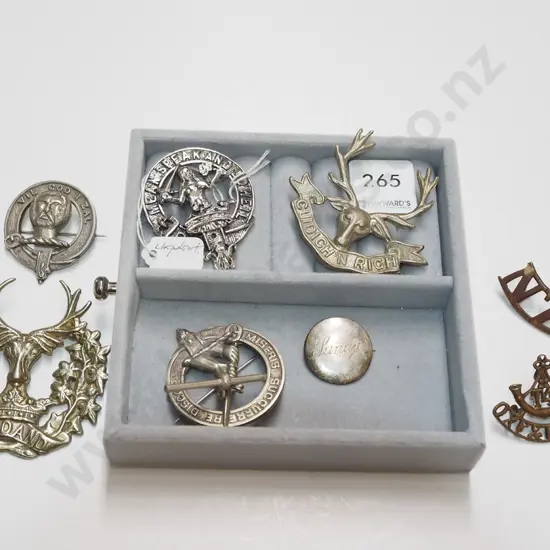 tray; military and clan badges