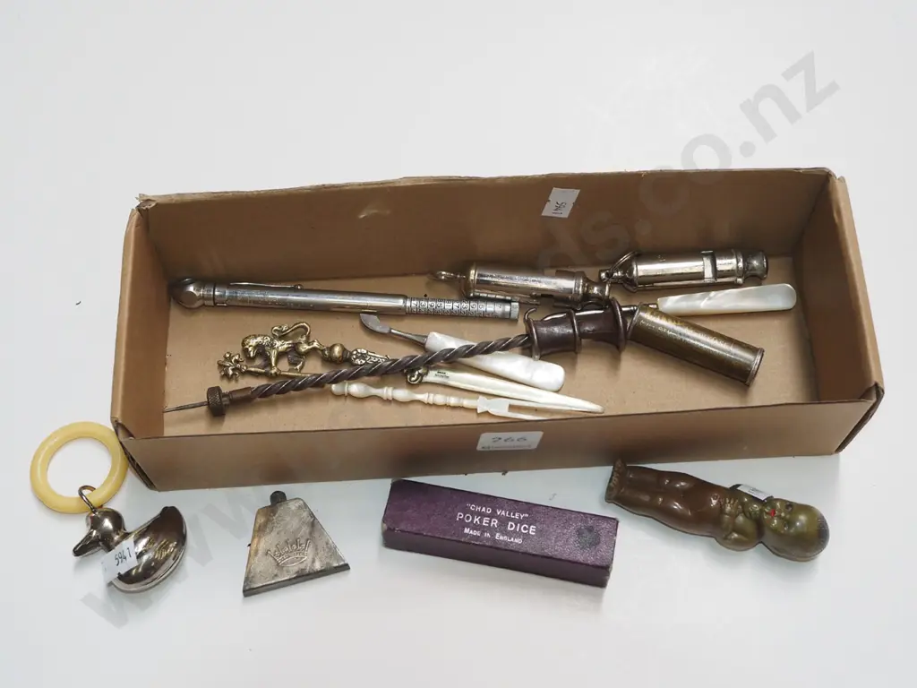 box; whistles, small doll, poker dice etc Image 1++