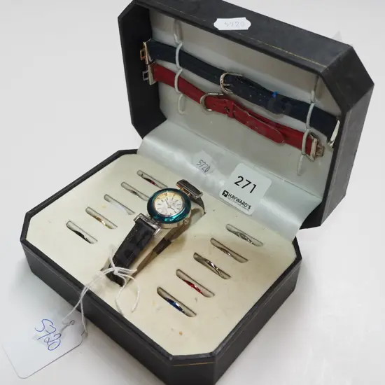ladies watch in box with assorted accessories