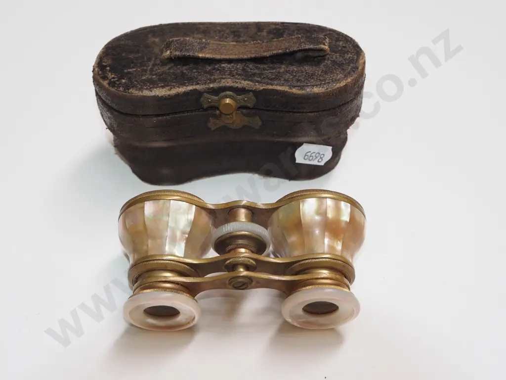 pair of brass opera glasses in case Image 1++