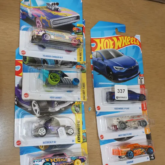 7x as  new carded Hotwheels vehicles
