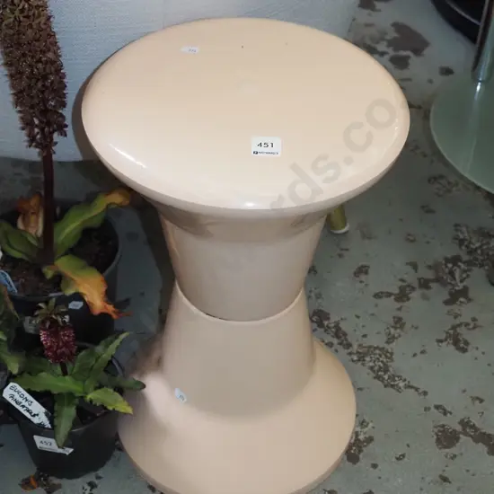 pink plastic Caroma stool