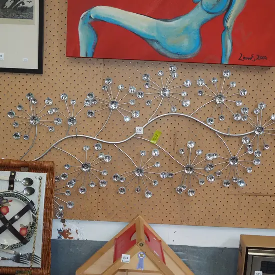 metal and cut glass wall art