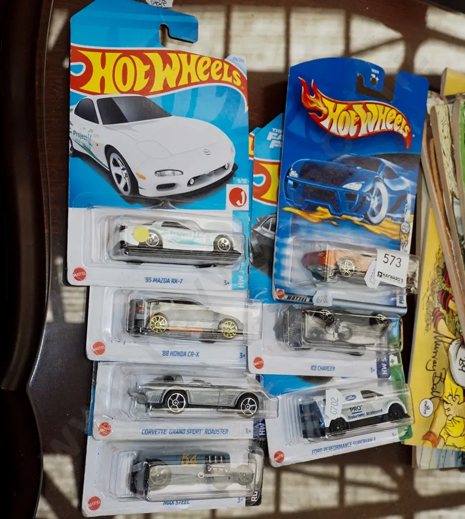 7x as new carded Hotwheels vehicles Image 1++
