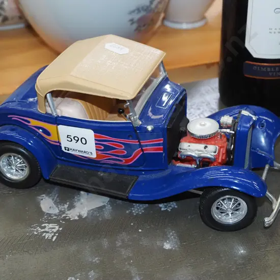 diecast model of a hot rod L220