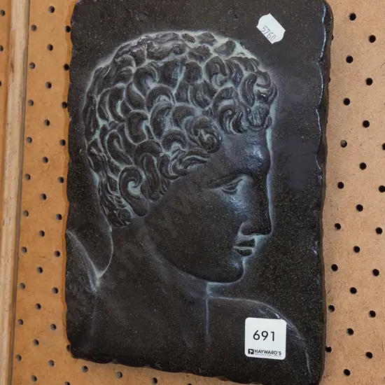 carved stone Hermes figurine