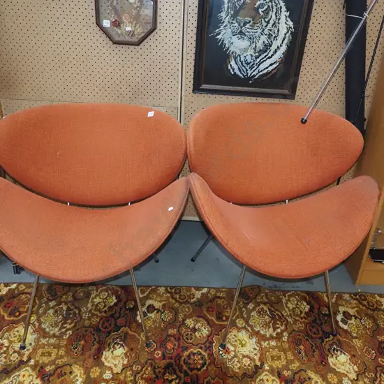 2x orange upholstered  lip chairs - marks to fabric