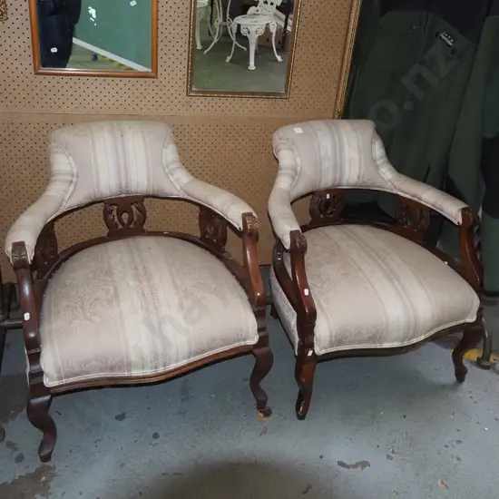 2x Victorian mahogany upholstered tub chairs - missing casters - stains to upholstery