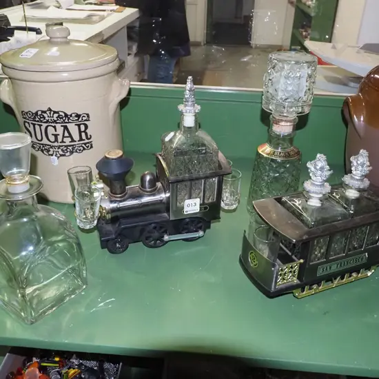 novelty train decanter, 2x other decanters
