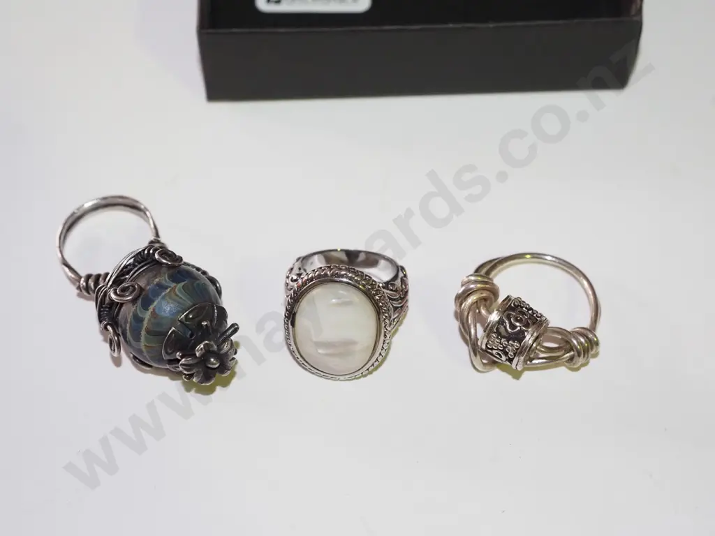 1x large copper and mop stone ring, 2x sterling silver worry rings Image 1++