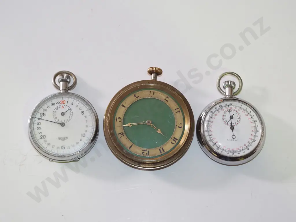plastic tray of stop watches, car clock watch Image 1++