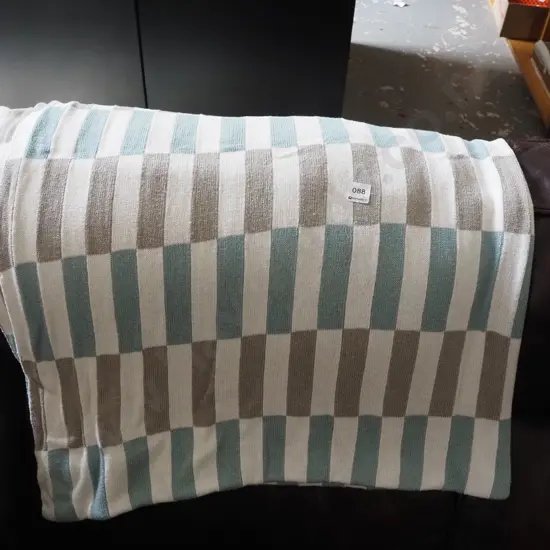 cream, teal and fawn throw/bed cover