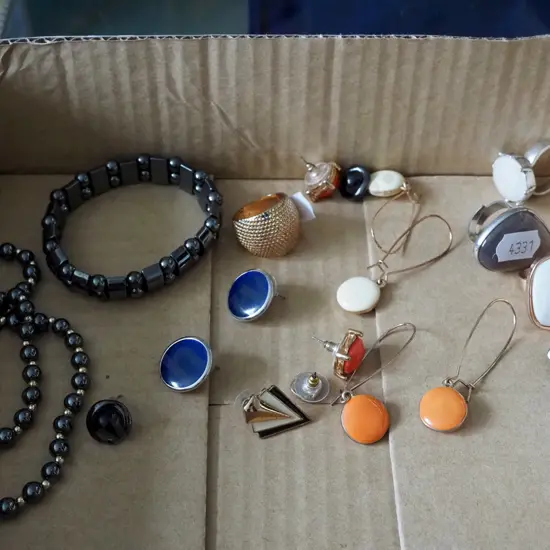 box; costume rings, earrings etc